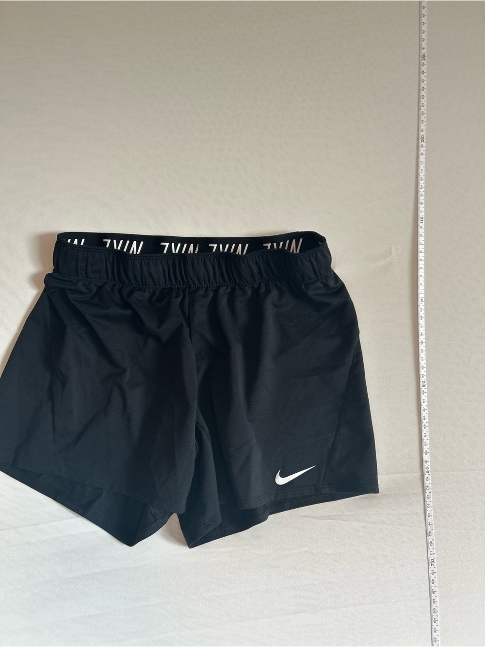 Nike Black Women's Dri-FIT Athletic Shorts with White Swoosh